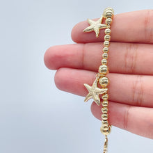 Load image into Gallery viewer, 18k Gold Filled 4mm Beaded Bracelet With Starfish Charms In An Sophisticated Slide Clasp Jewelry
