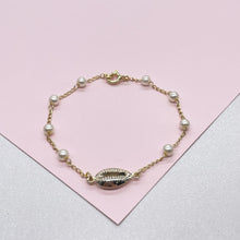 Load image into Gallery viewer, 18k Gold Filled Delicate Pearl Bracelet featuring Cowrie Shell in the middle for a Summer Look
