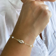 Load image into Gallery viewer, 18k Gold Filled Delicate Pearl Bracelet featuring Cowrie Shell in the middle for a Summer Look
