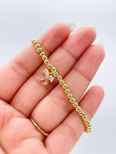 Load image into Gallery viewer, 18k Gold Filled Elastic Classic 4mm Beaded Bracelet with CZ Dainty Bow
