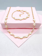 Load image into Gallery viewer, 18k Gold Filled Dainty Choker Chain and Bracelet with Cowrie Puka Shell Charms
