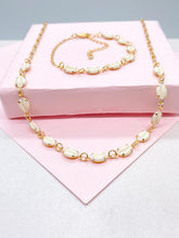 Load image into Gallery viewer, 18k Gold Filled Dainty Choker Chain and Bracelet with Cowrie Puka Shell Charms