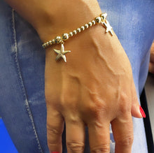 Load image into Gallery viewer, 18k Gold Filled 4mm Beaded Bracelet With Starfish Charms In An Sophisticated Slide Clasp Jewelry
