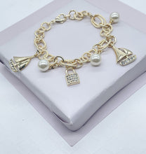 Load image into Gallery viewer, 18k Hold Filled Sea Life Charm Bracelet, With Pearl Charms and Sailing Boats
