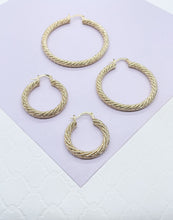 Load image into Gallery viewer, 18k Gold Filled Rough Diamond CutTwisted Gold Hoops
