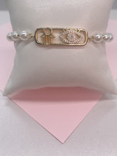 Load image into Gallery viewer, 18k Gold Filled Adjustable Hamsa and Evil Eye Pearl Bracelet
