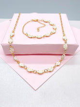 Load image into Gallery viewer, 18k Gold Filled Dainty Choker Chain and Bracelet with Cowrie Puka Shell Charms
