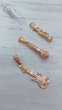 Load and play video in Gallery viewer, 18k Gold Filled Musical Instruments Microphone, Guitar and Trumpet Charms   Dainty Pendants And Jewelry Making Supplies
