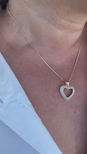 Load and play video in Gallery viewer, 18k Gold Filled Heart Pendant wth smooth sleek outline and with Round CZ Stones
