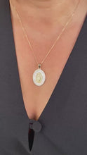 Load and play video in Gallery viewer, 18k Gold Filled Mother of Pearl Oval Medallion Engraved with Virgin Mary &amp; CZ
