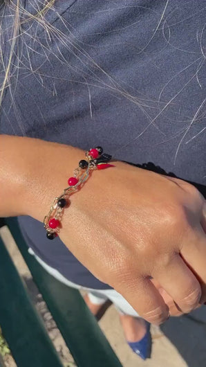 18k Gold Filled Bracelet with black and red beads and Pepper & Figa Charms