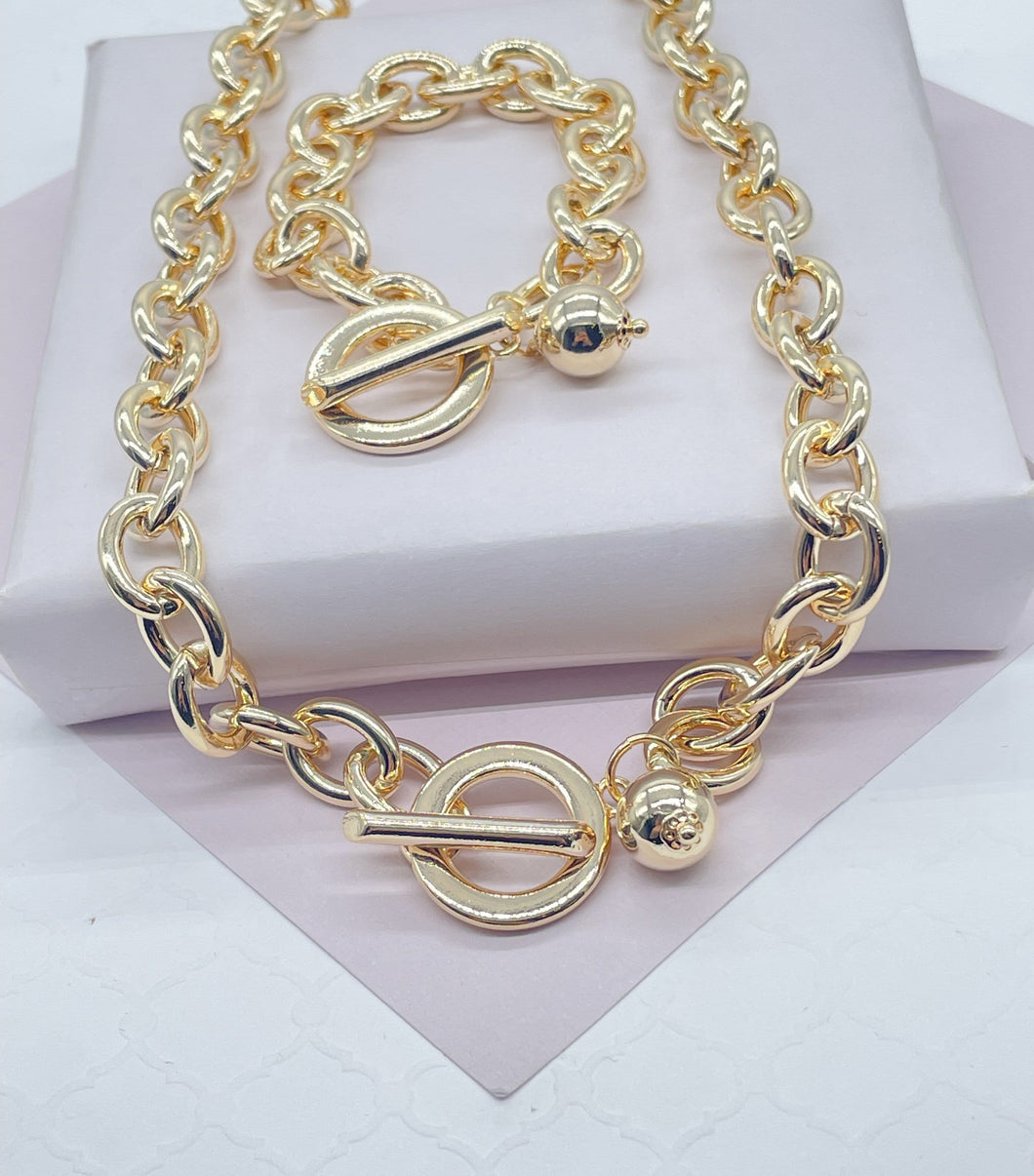18k Gold Filled Oval Link Necklace And Bracelet Set Featuring Toggle Closure And Hanging Ball