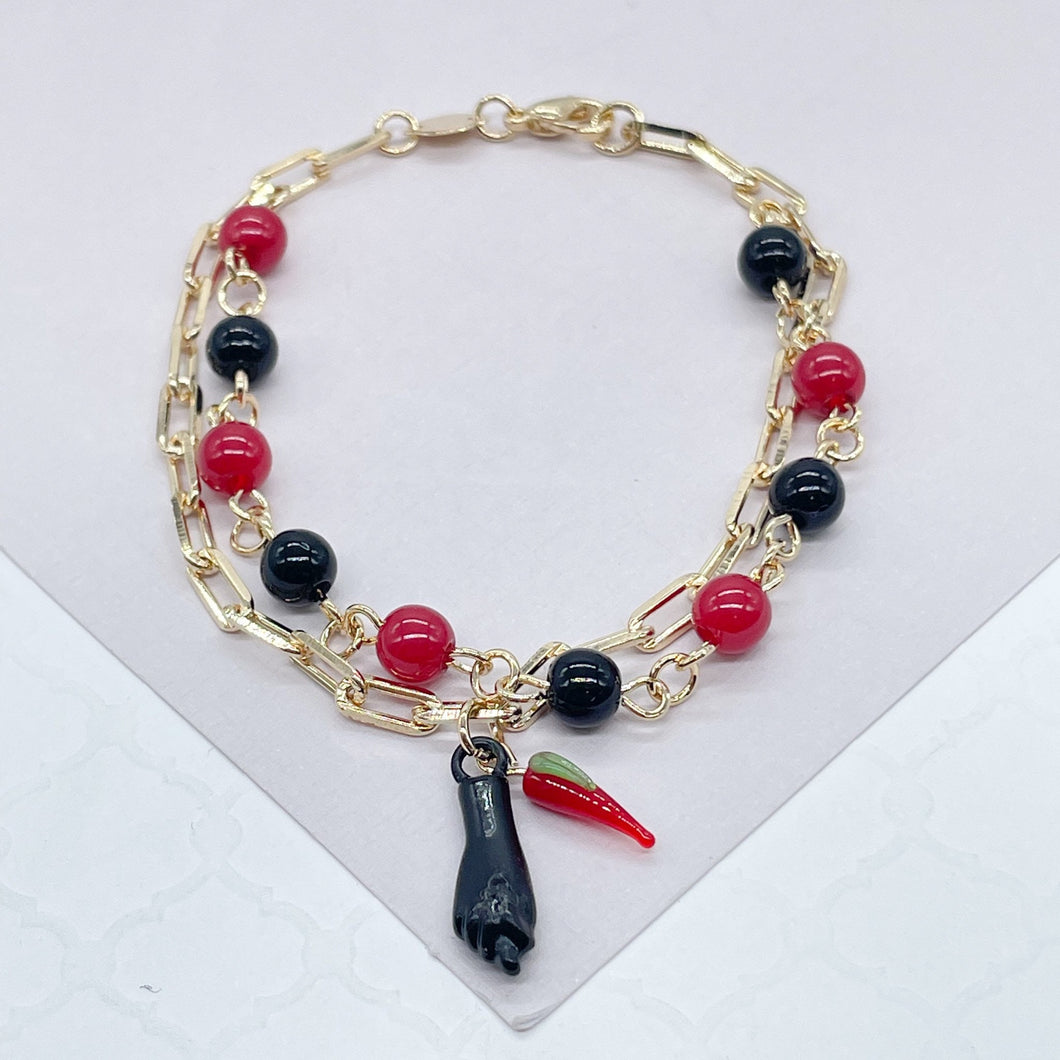 18k Gold Filled Bracelet with black and red beads and Pepper & Figa Charms